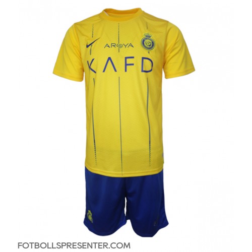 Al-Nassr Hemmatröja Barn 2023-24 Kortärmad (+ korta byxor)